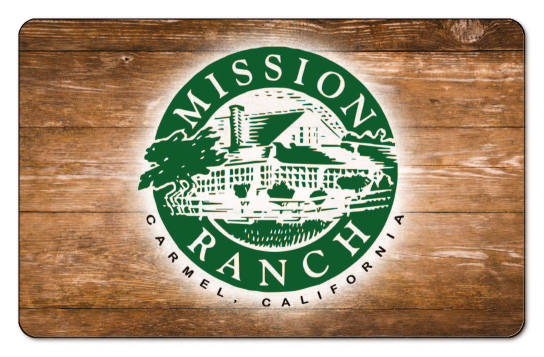 mission ranch logo on a wood board background